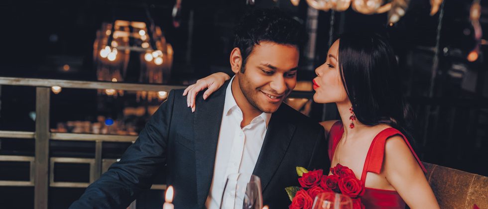 romantic couple enjoying dinner together