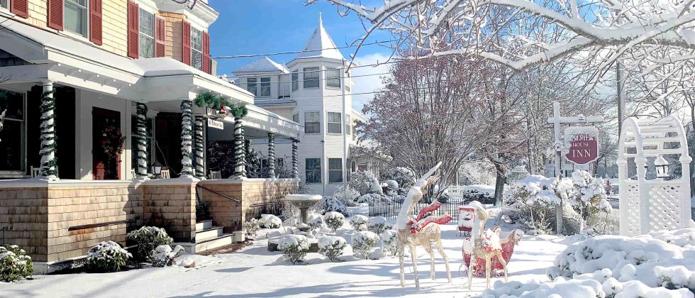 Palmer House Inn covered in snow on a sunny winter day