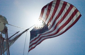 Stars and Stripes Flying on a Military Tallship