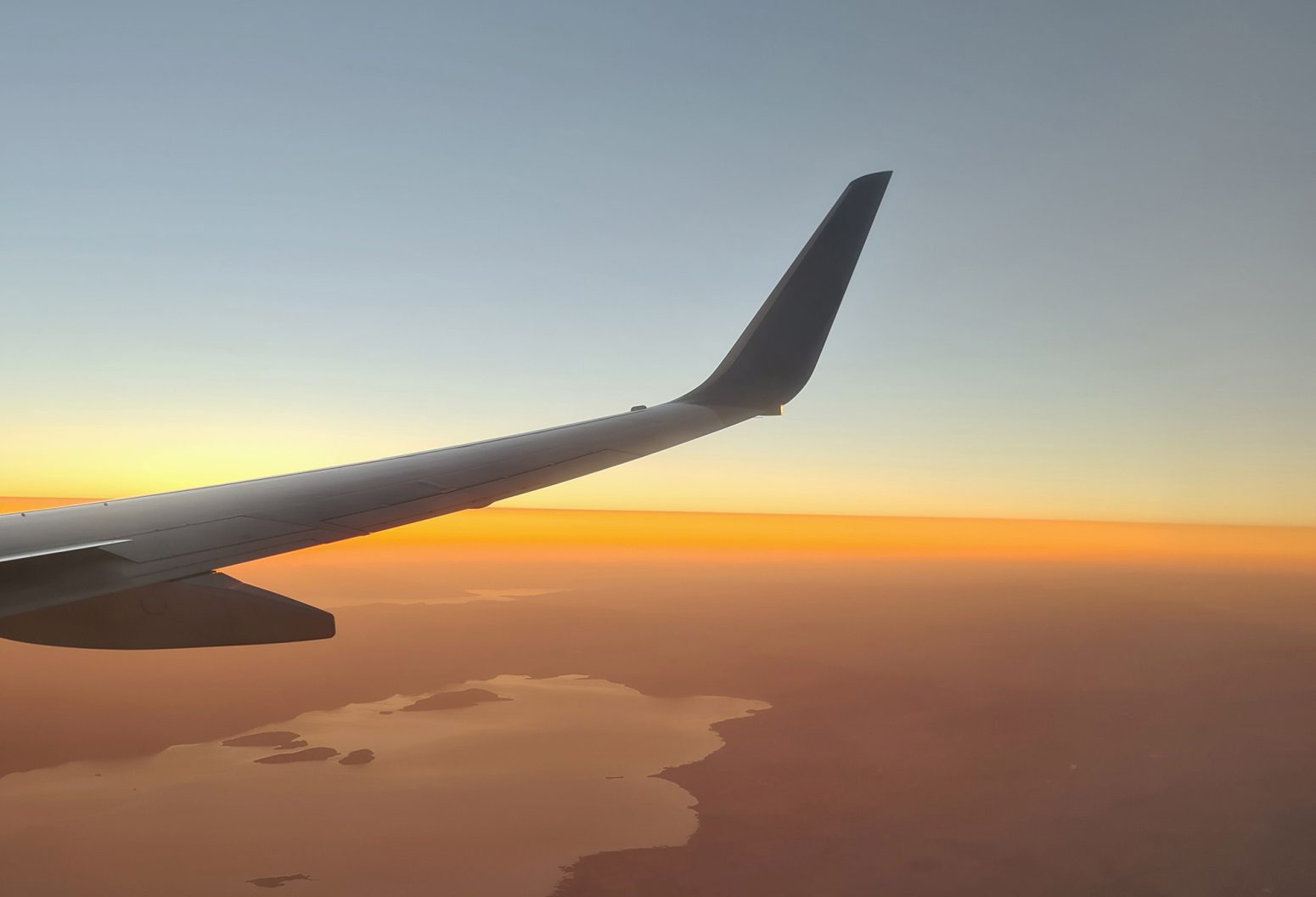 airplane wing over Cape Cod