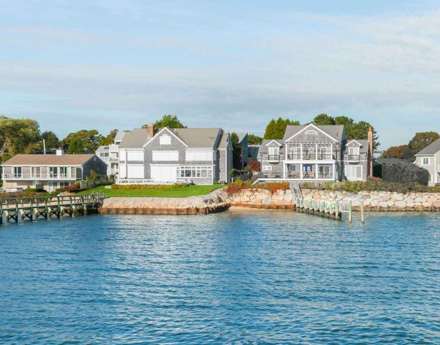 Row of houses on the water in Cape Cod