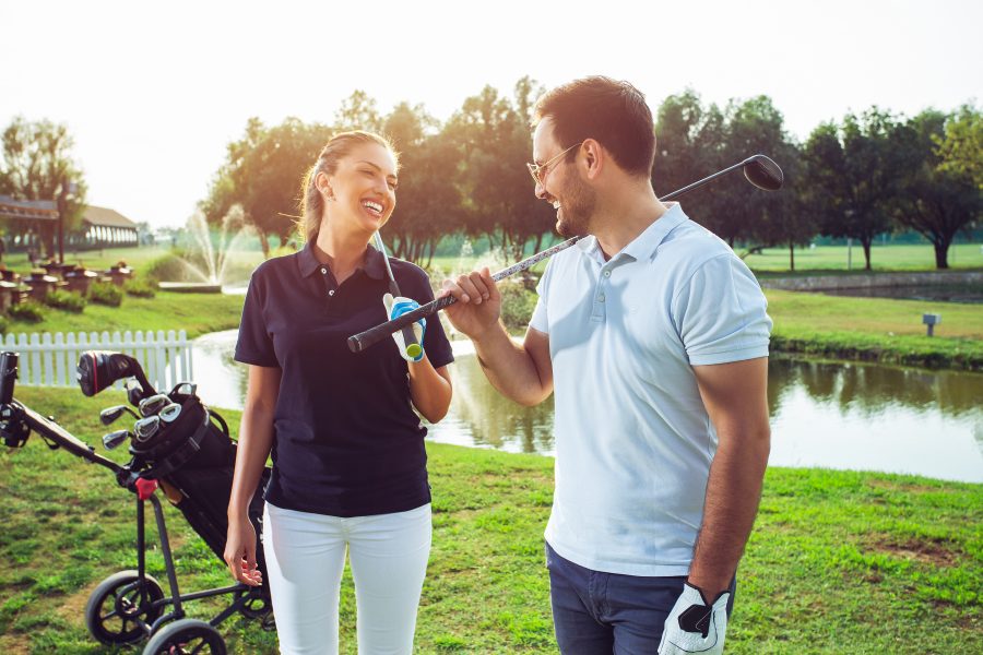 Couple Golfing on Getaway from NYC
