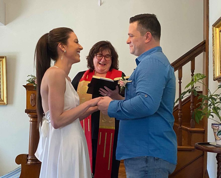 Cape Cod elopement on the stairs at the Palmer House Inn