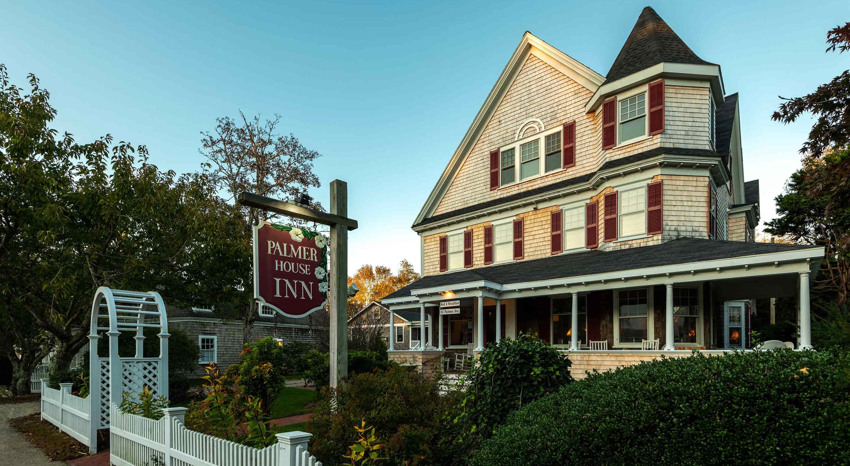 Exterior view of Palmer House Inn at dusk