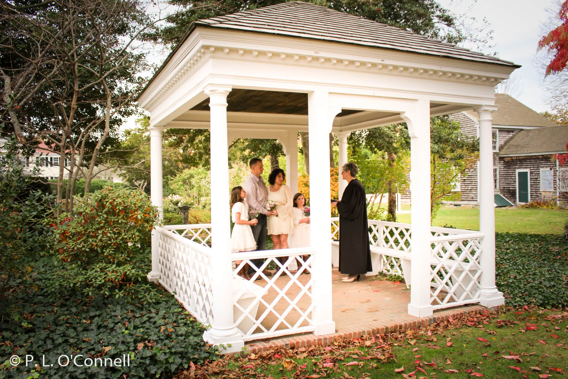 Wedding ceremony in the gazebo at the Museums on the Green in Falmouth, Cape Cod, Massachusetts, USA.