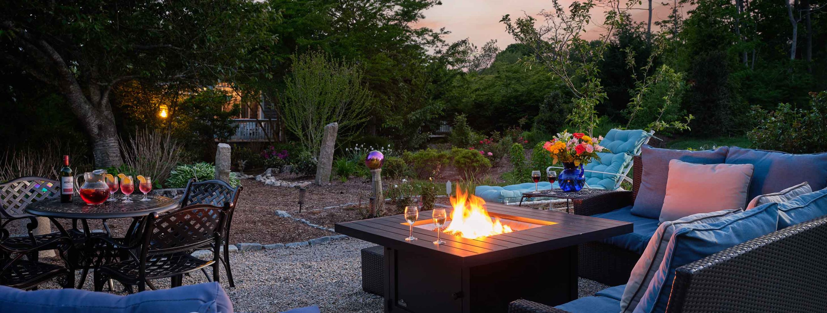 Fire pit at sunset with wine