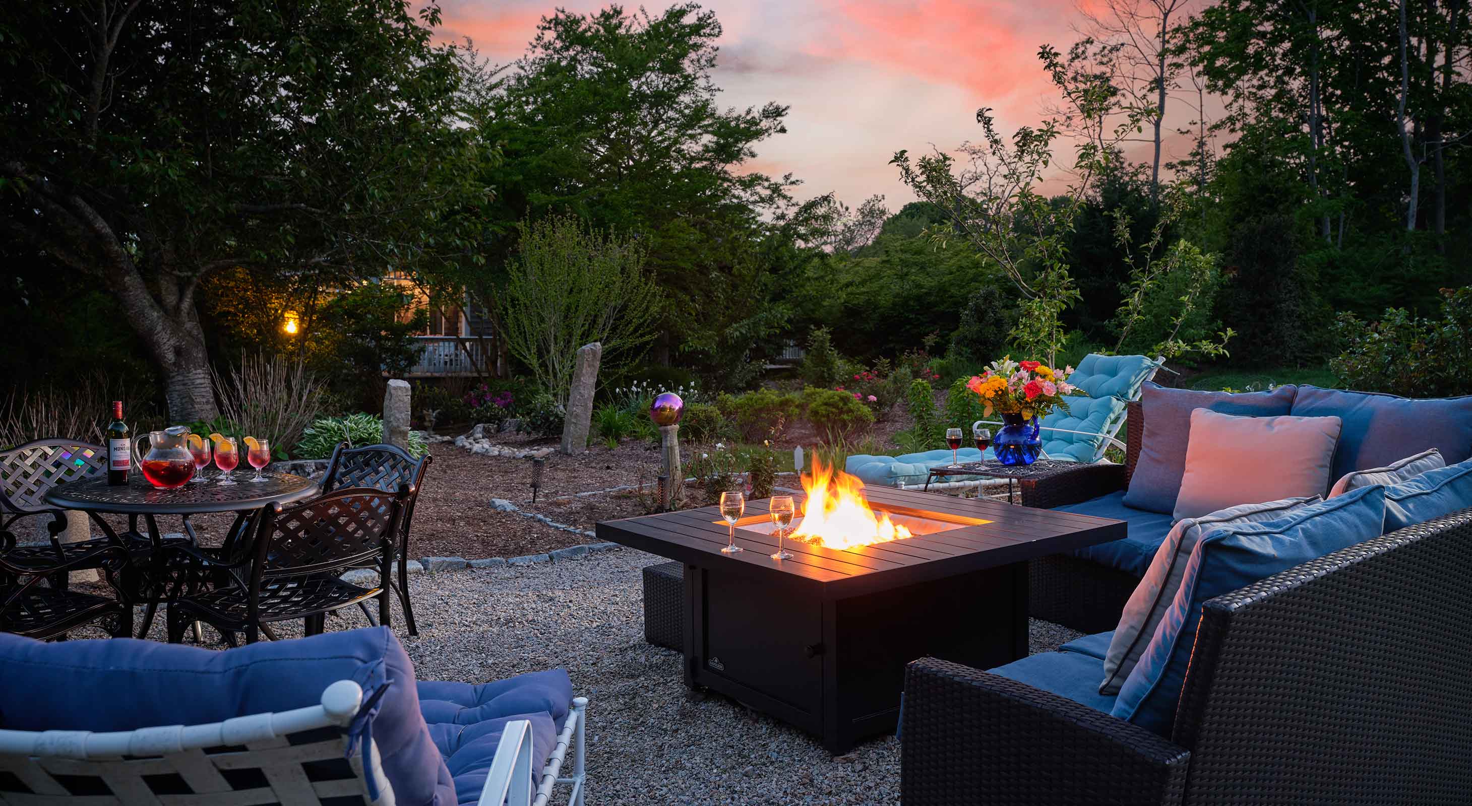 Fire pit at sunset with wine