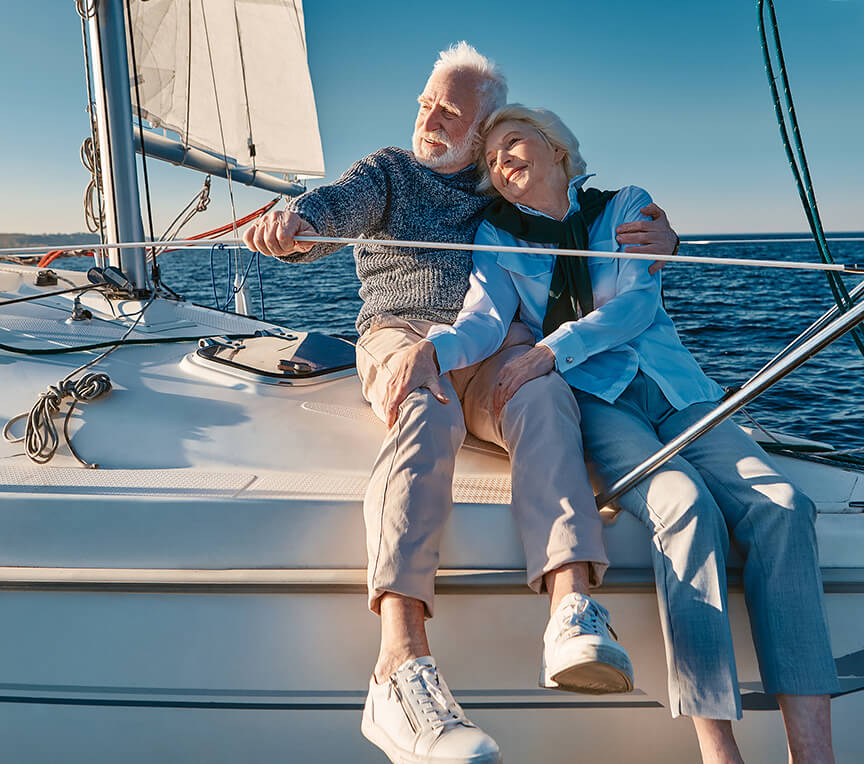 Older couple on sailboat on Cape Cod