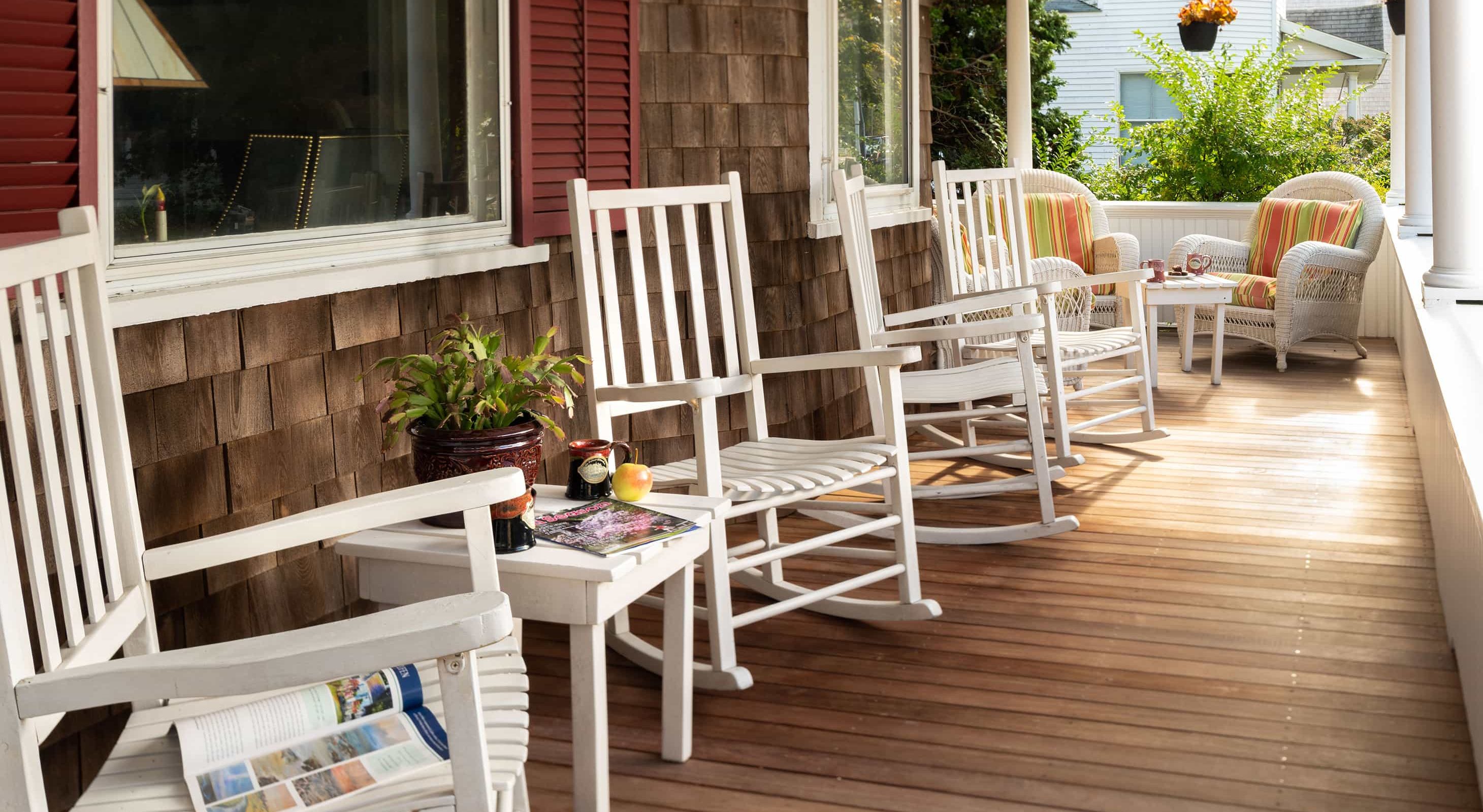 white rocking chairs on the front porch at Cape Cod bed and breakfast