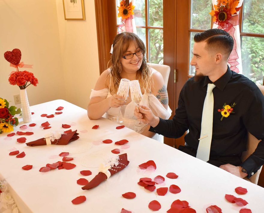 Cape Cod elopement with red rose petals