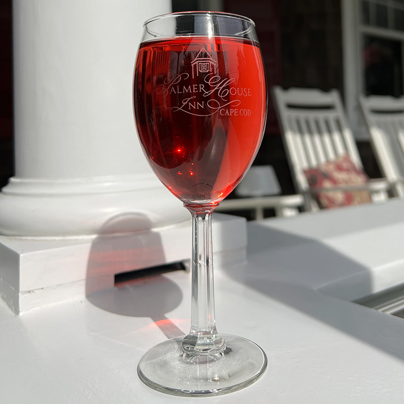 wine glass etched with the Palmer House Inn logo